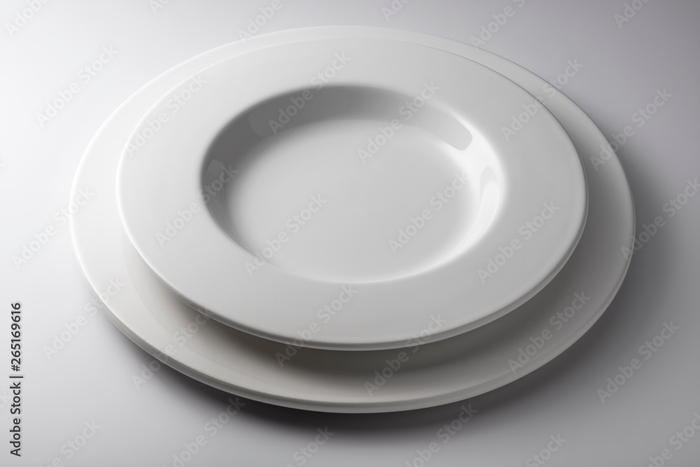 Set Round and white thick bowl and flat plate Set Round and white thick bowl and flat plate