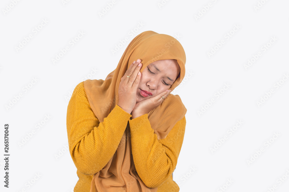 Frustrated young asian woman, face expression of Muslim asian woman wearing hijab isolated over white background Frustrated young asian woman, face expression of Muslim asian woman wearing hijab isolated over white background