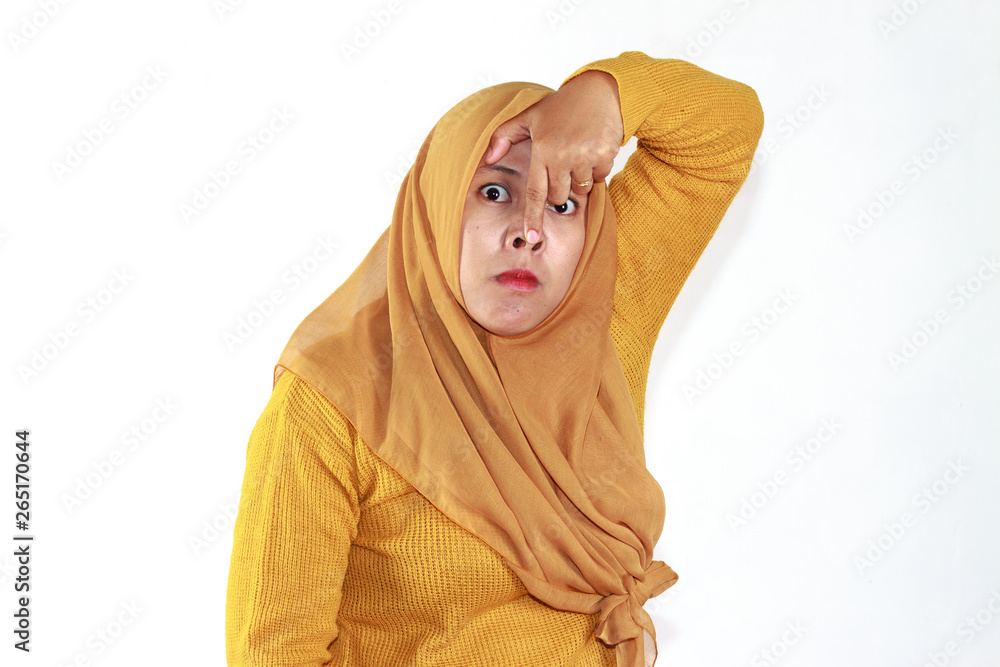 funny expression of Muslim asian woman wearing hijab isolated over white  background Stock Photo | Adobe Stock