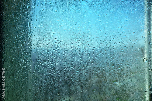 Steam Drops on Glass Window Background.