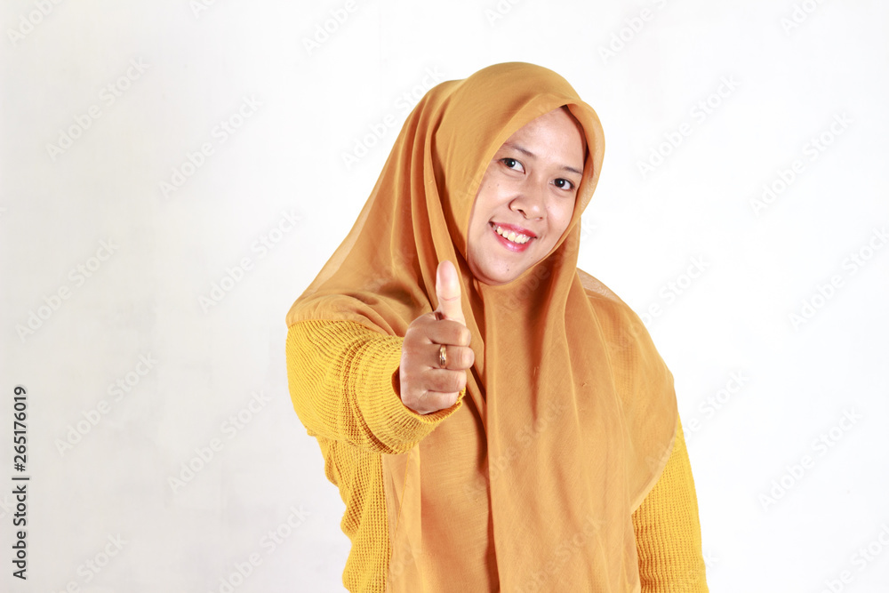 Young beautiful smiling Asian woman express surprised and excited, face expression of Muslim asian woman wearing hijab isolated over white background Young beautiful smiling Asian woman express surprised and excited, face expression of Muslim asian woman wearing hijab isolated over white background