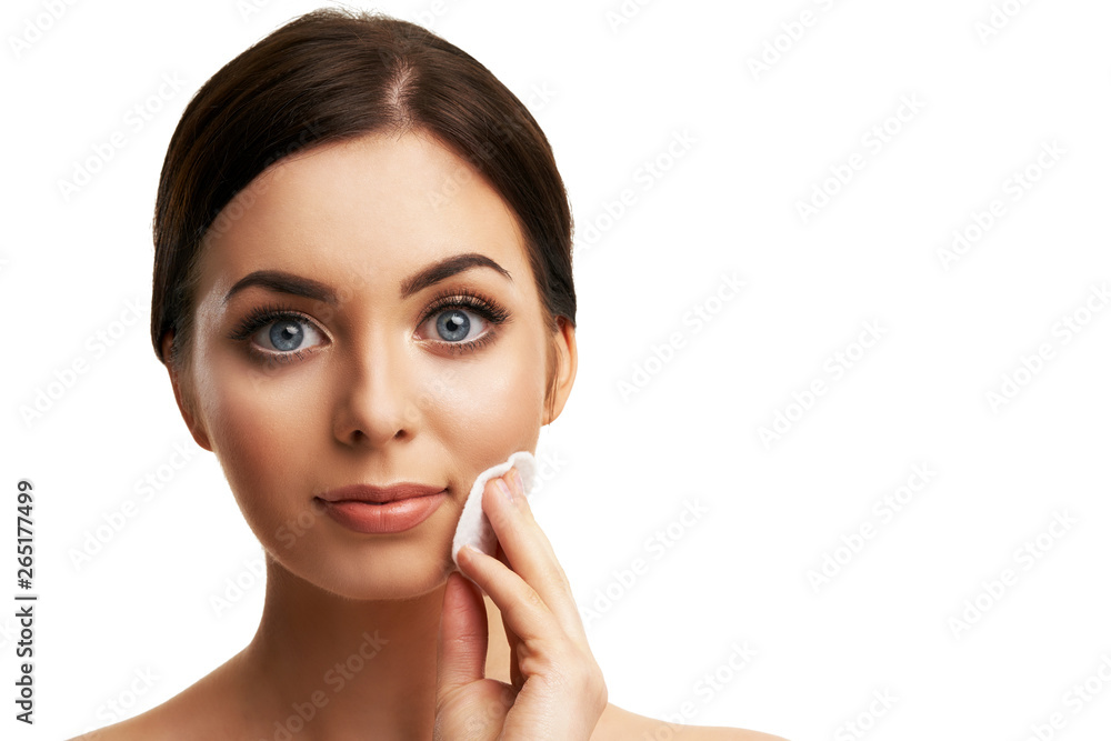 Beautiful woman face close up studio on white Beautiful woman face close up studio on white
