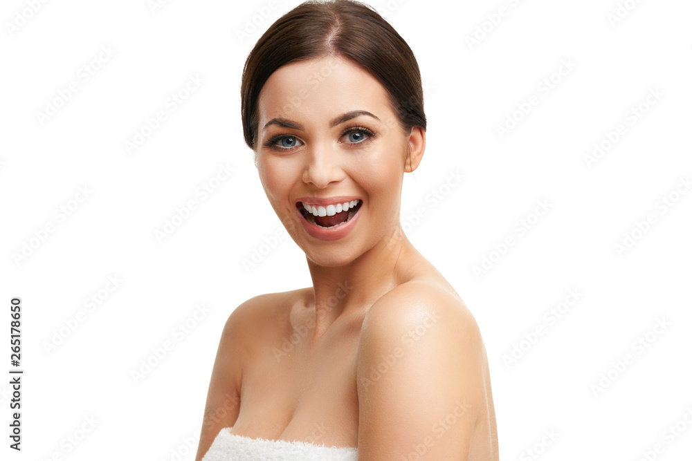 Beautiful woman face close up studio on white Beautiful woman face close up studio on white