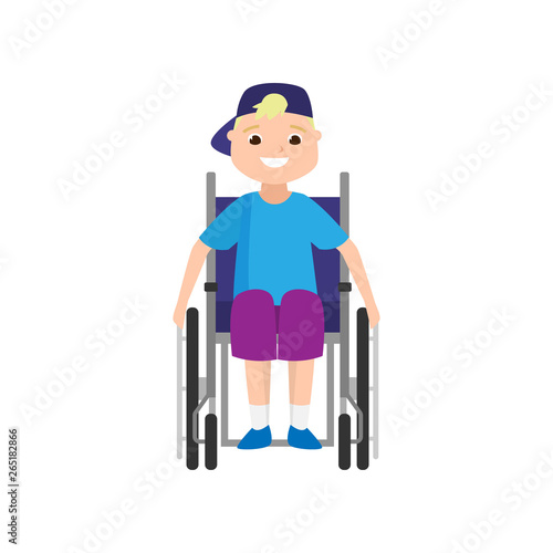 Cute smiling blonde boy, front view in wheelchair