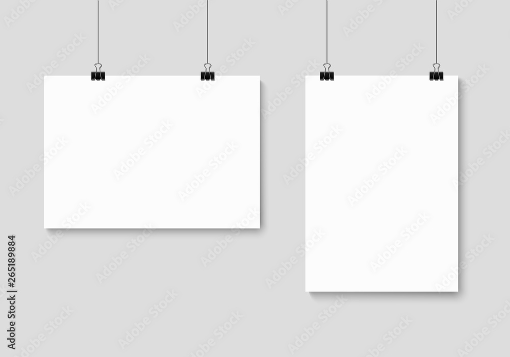 Empty A4 sized paper frame mockup hanging with paper clip Empty A4 sized paper frame mockup hanging with paper clip