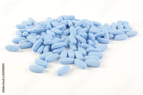  Blue pills on white background photo