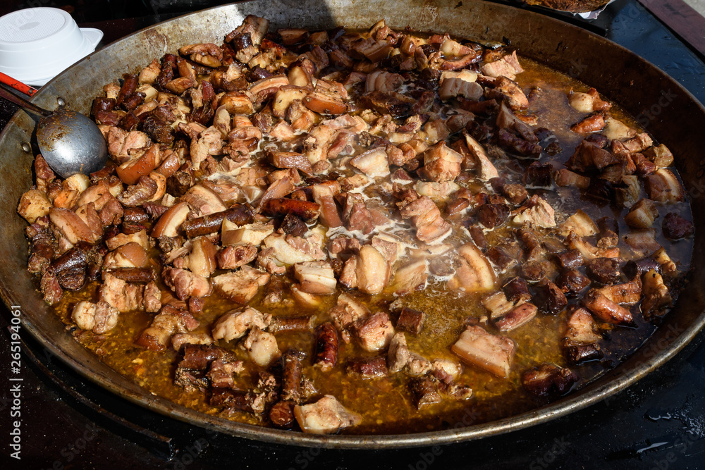Deep fried meat being cooked at a street food festival Deep fried meat being cooked at a street food festival