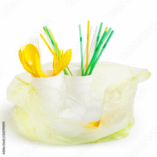 Plastic bag full of plastic utensils photo