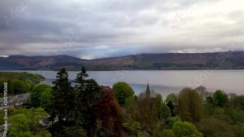 Aerial depiction of the beautiful village of Luss and majestic Ben Lomond,  situated on the banks of Loch Lomond, Scotland.