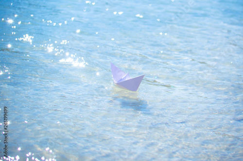 paper boat in the water © Serhii  Holdin