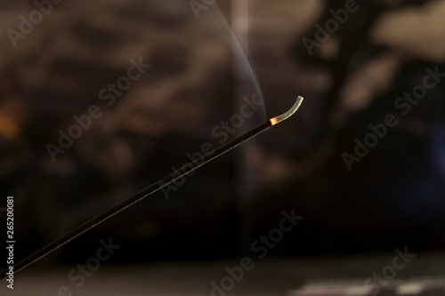 lit incense stick © pina_photos