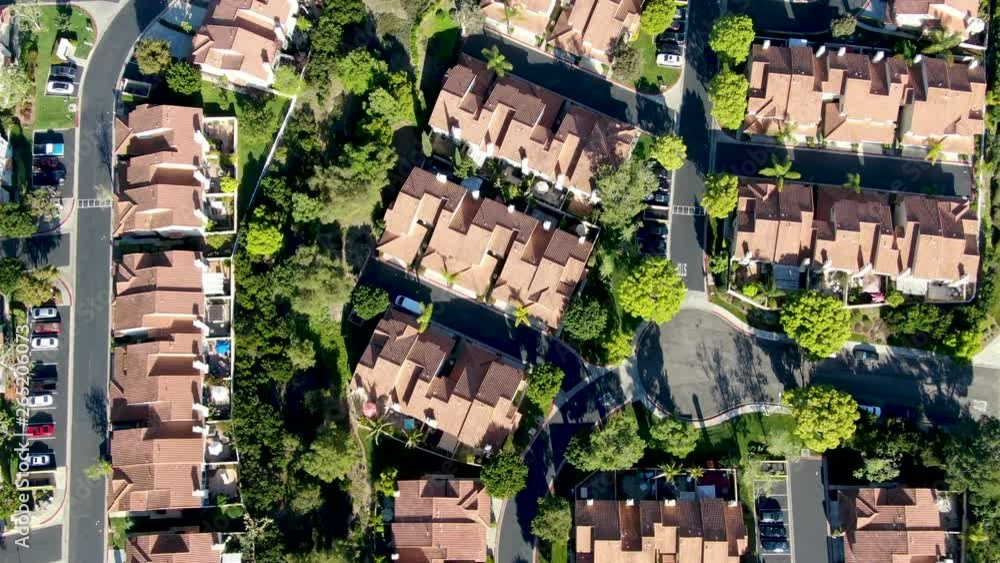 Aerial view suburban neighborhood with identical villas next to each ...