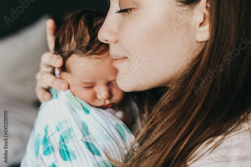 young mother with her newborn baby