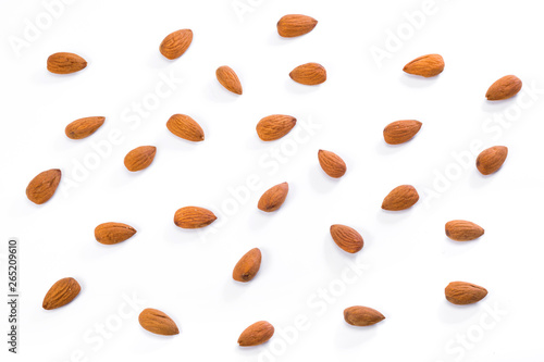 Almonds isolated on white background. Top view, raw nuts.