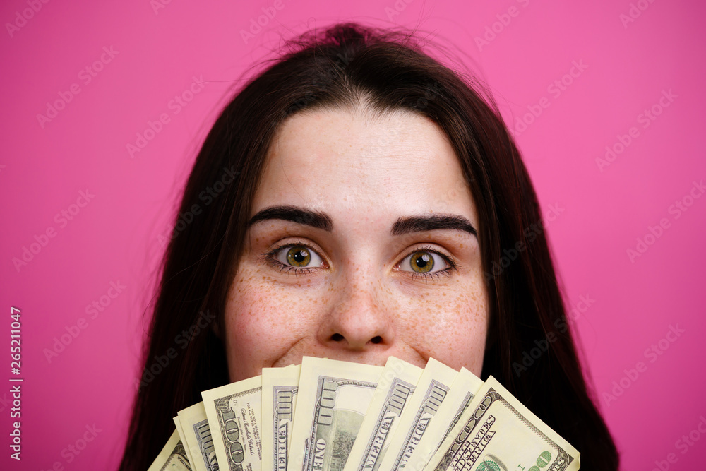 Save money or investment financial for future concept. Rich woman with dollars in hands. Money management and finances. Save money or investment financial for future concept. Rich woman with dollars in hands. Money management and finances.