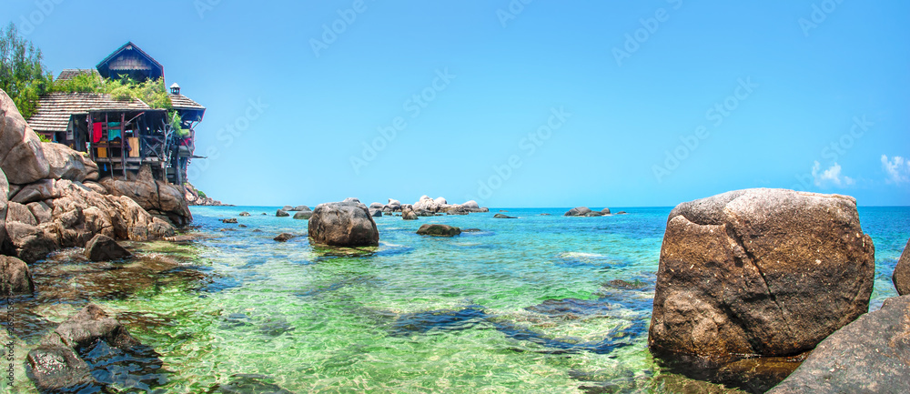 Idyllic tropical beach, palm, white sand and crystal clear water