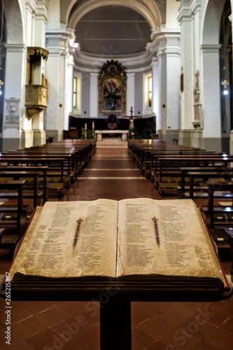 A bible open on a lectern at the entrance of a Catholic church in Urbino, central Italy