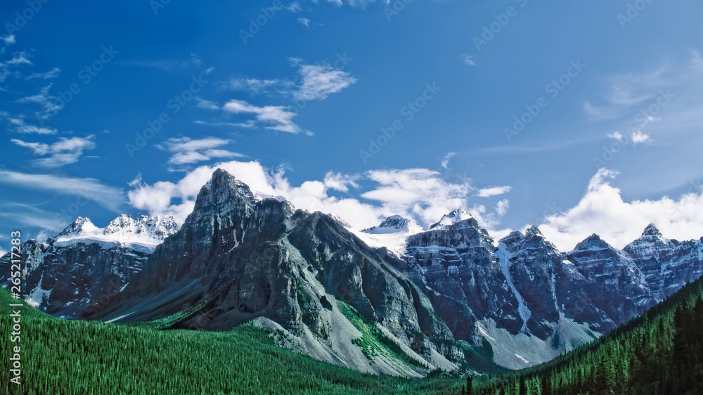 Fototapeta premium Mountain peaks of the Bow Range rise above the Valley of the Ten Peaks, Banff National Park, Canada
