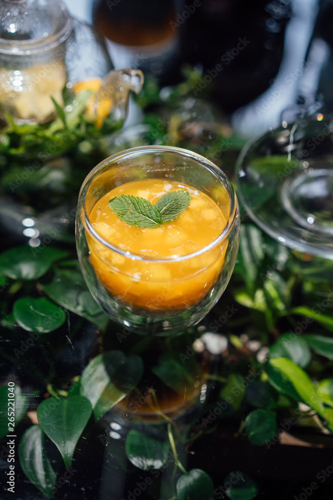Fresh passion fruit and a glass of passion fruit drink Fresh passion fruit and a glass of passion fruit drink