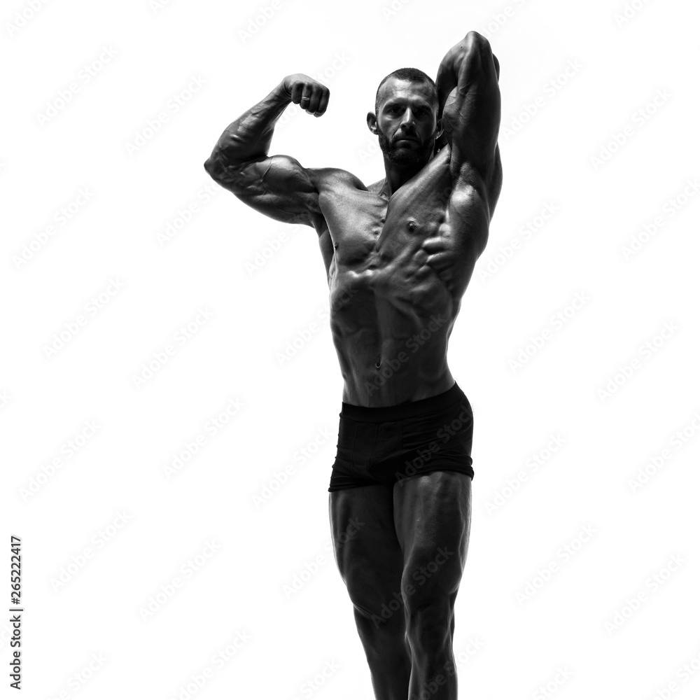 Black and White Image of Strong Muscular Men Flexing Muscles Black and White Image of Strong Muscular Men Flexing Muscles