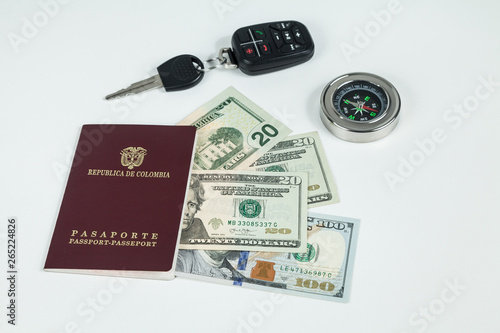 travel concept, Colombian passport with dollar bills for travel abroad