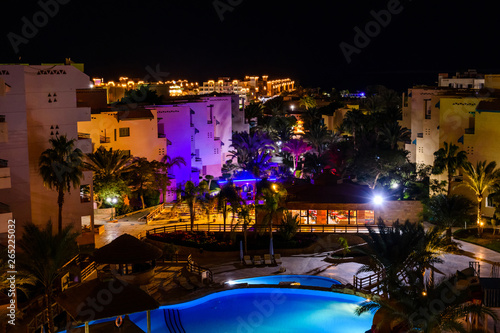 View on a swimming pool in hotel resort at night © ihorbondarenko