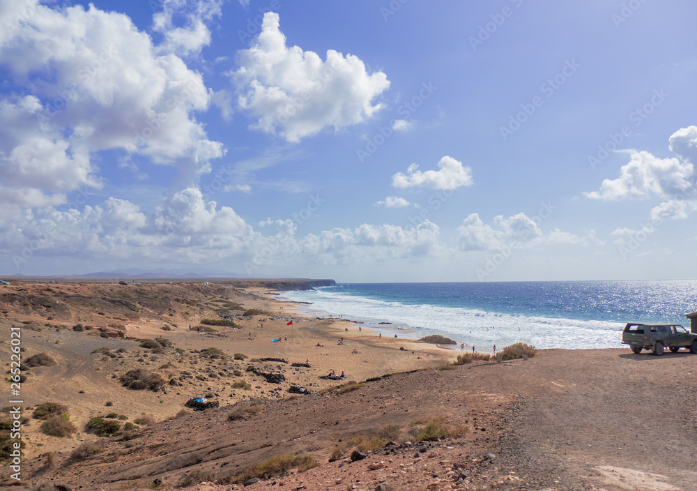 El Cotillo - Fuerteventura, long sandy beach, windy and frequented by surfers all year round El Cotillo - Fuerteventura, long sandy beach, windy and frequented by surfers all year round