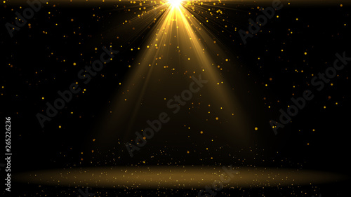 Gold lights shining .golden background with shiny stars and rays.Sparkles or particle glitter lighting . Merry Christmas festive abstract background 