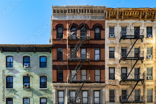 Block of colorful old buildings with clear blue sky background in the Upper East Side of Manhattan New York City
