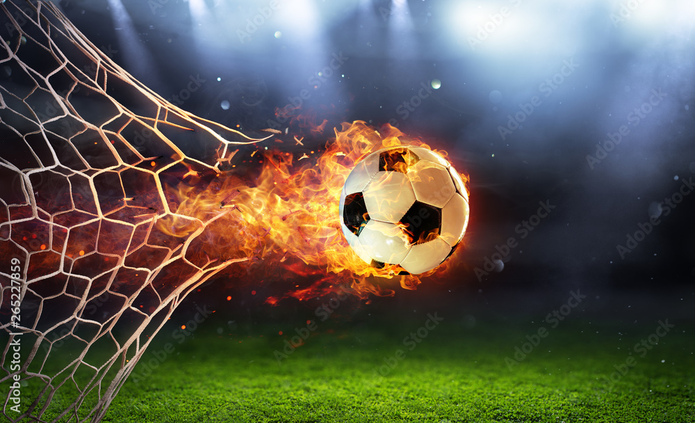Photo & Art Print Fiery Soccer Ball In Goal With Net In Flames