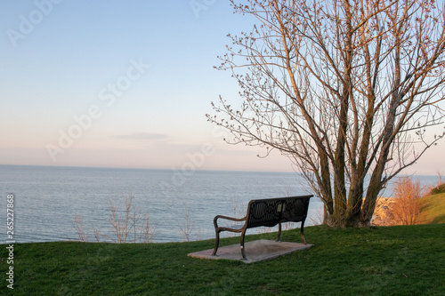 setting sun at park bench