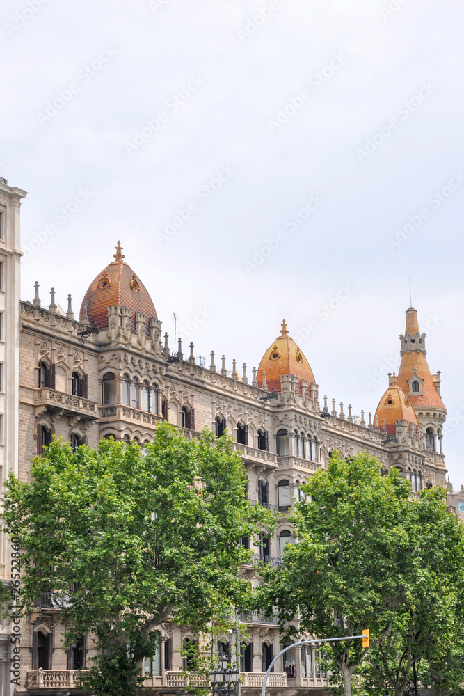 Barcelona Spain Cityscape. Old building with golden towers. taken on a cloudy day.
