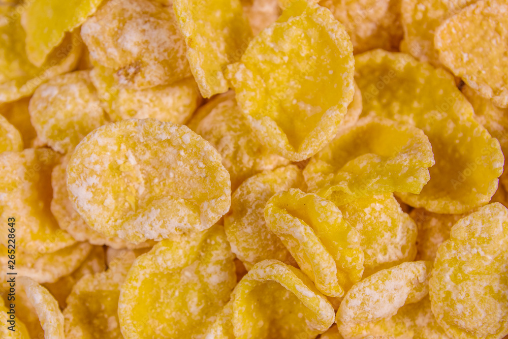 Background of the many yellow cornflakes. Healthy eating Background of the many yellow cornflakes. Healthy eating