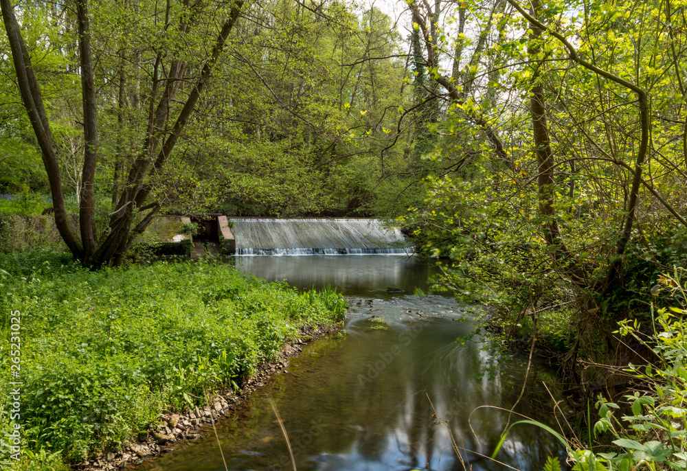 Weir at the knapp and papermill nature reserve near Alfrick Worcestershire Weir at the knapp and papermill nature reserve near Alfrick Worcestershire