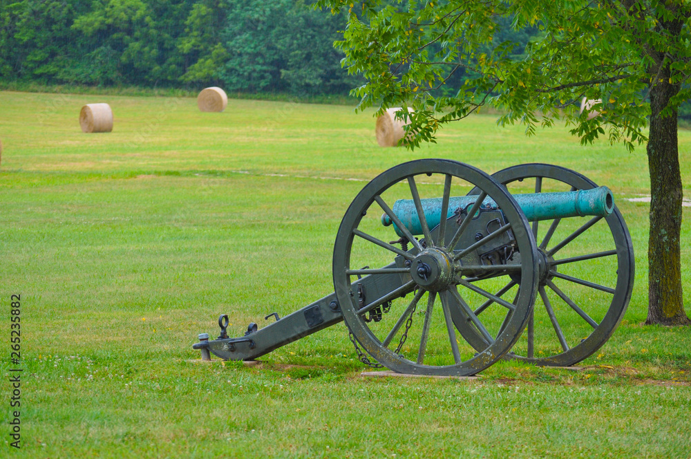 Civil War Cannon in hay field