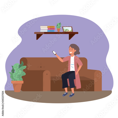 Millenial person sitting using smartphone indoors background frame