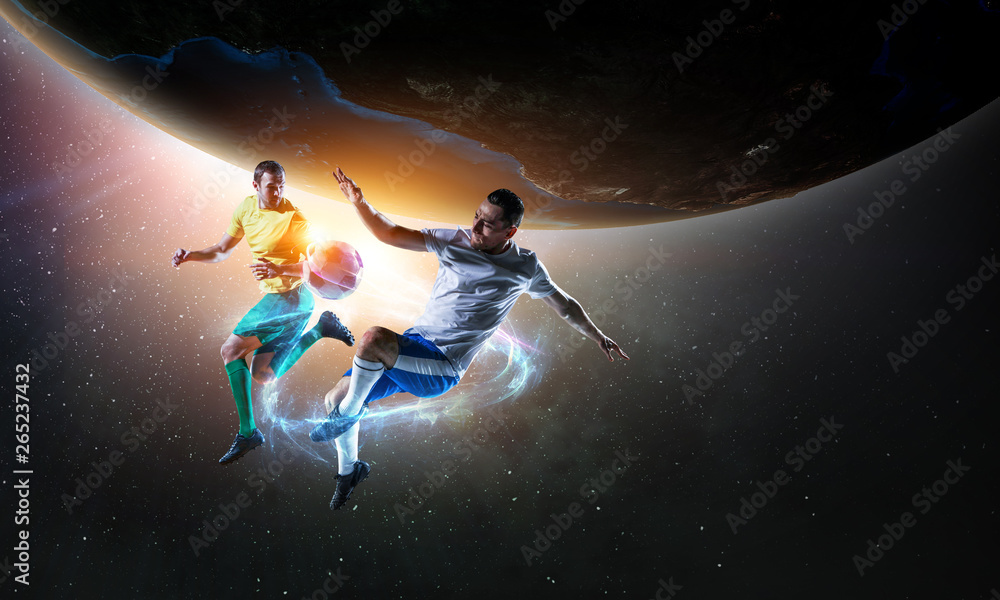 Naklejka premium Soccer players on stadium in action. Mixed media