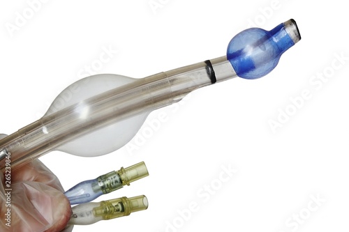 Tip of endobronchial cannula used in anaesthesiology during lung surgeries, with both balloons inflated and inflating ports visible, white background © zayacsk
