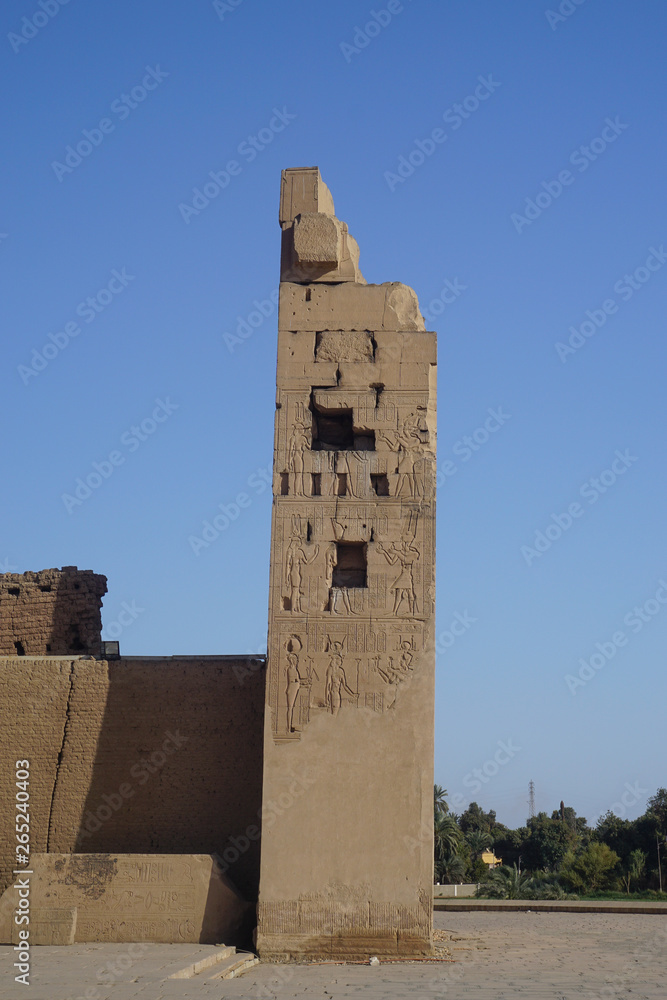 Kom Ombo, Egypt: A segment of a wall with carvings and cartouches at Kom Ombo Temple.