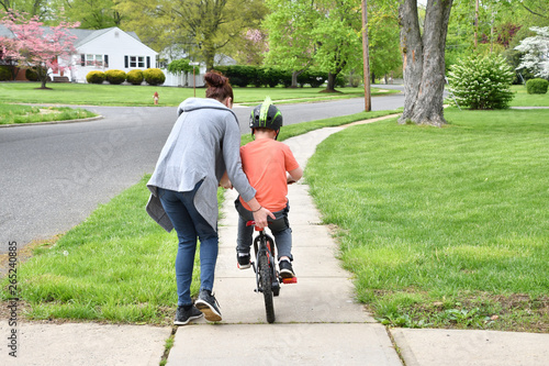 Boy Learning to Ride Bike