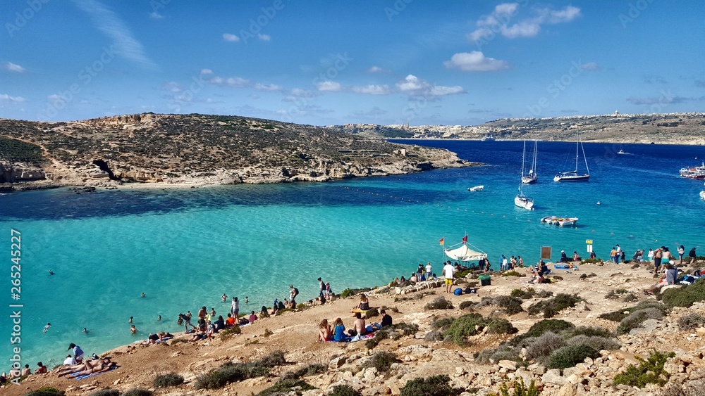 blue lagoon and boats in Malta