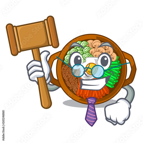Judge plate containing bibimbap cartoon on table