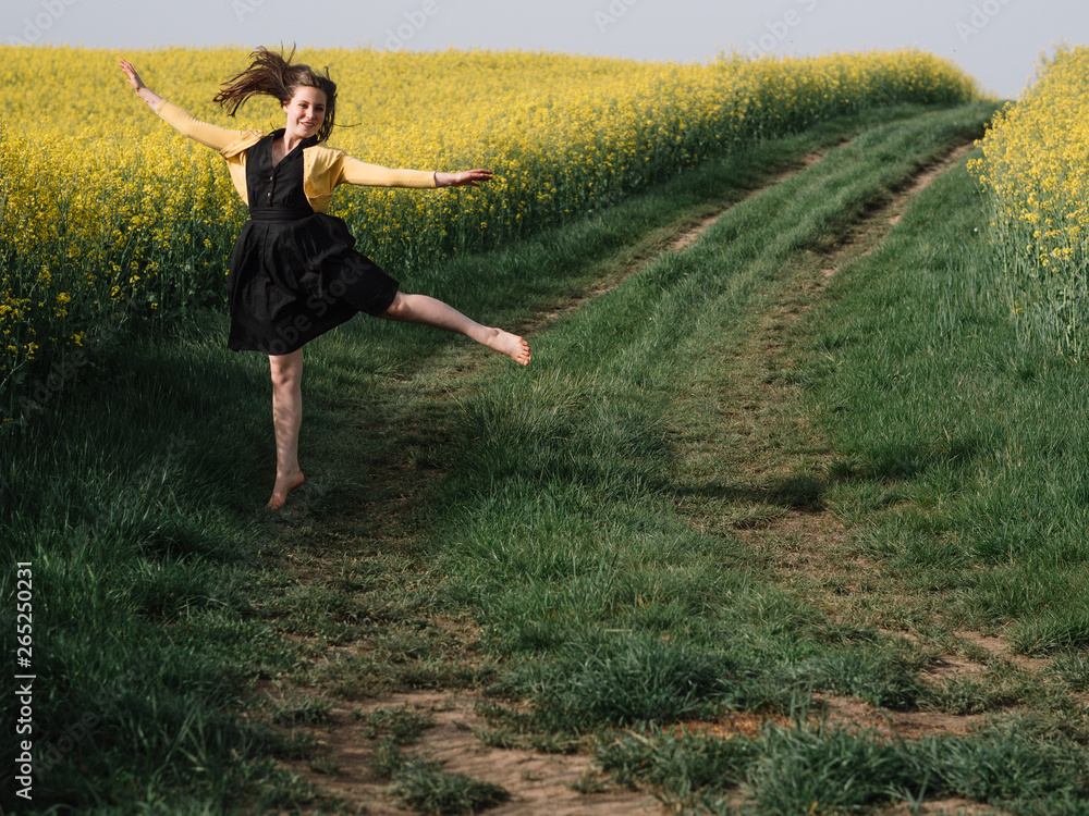carefree young girl jumping outdoor carefree young girl jumping outdoor