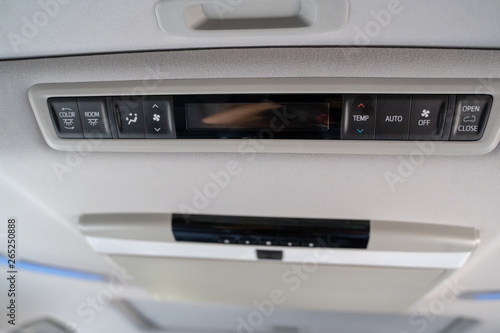 Interior lights in the car with air conditioning grille. air conditioning control panel in luxury car.