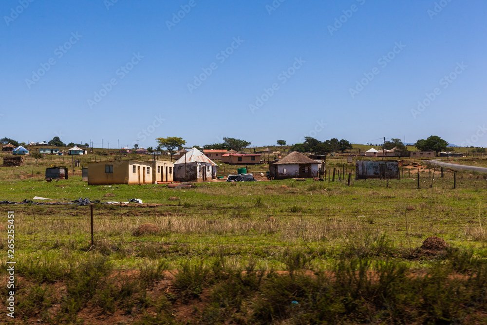 The rural huts and dwellings alongside the train tracks and the Ngwangwane river, Creighton, South Africa.
