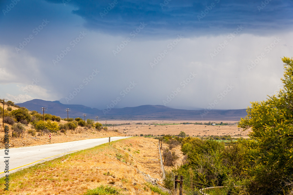 A large thunderstorm happening in the dry arid area of the karoo,  outside of the town of Cradock, South Africa.