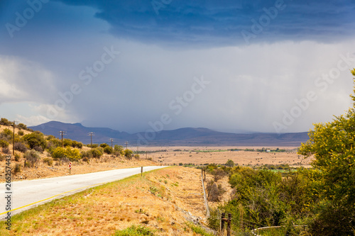 A large thunderstorm happening in the dry arid area of the karoo,  outside of the town of Cradock, South Africa. photo