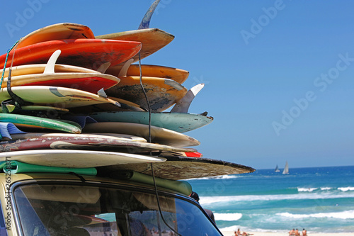 Photography retro surfboards on car roof  Sunny Day Bondi Beach