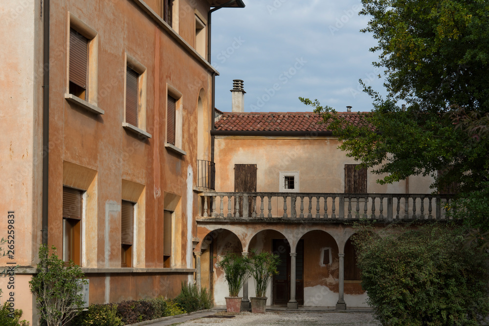 orange apartments with balcony and garden in Castelfranco Veneto, Italy