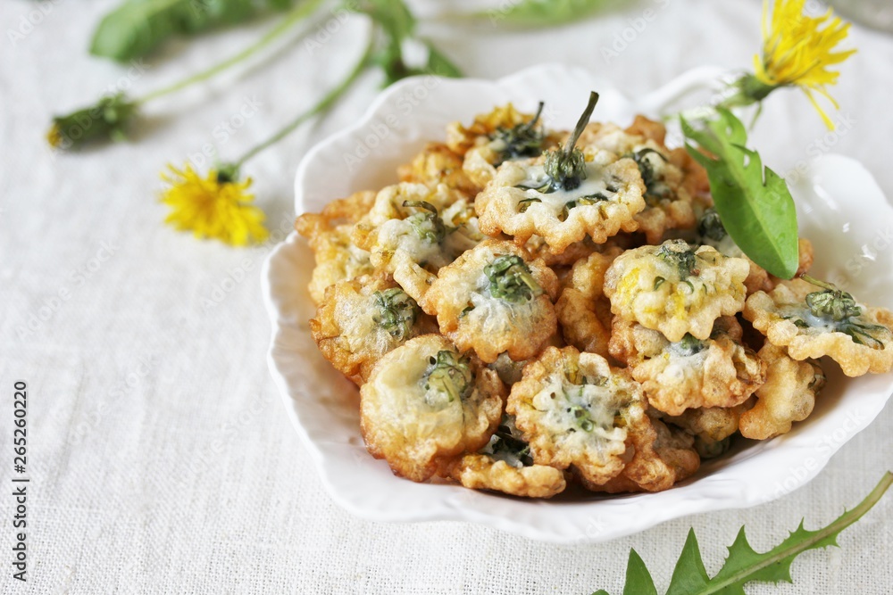 dandelion flowers fried in deep fried. Recipes from dandelion. organic healthy food. spring recipe. dishes from the first green. dandelion flowers fried in deep fried. Recipes from dandelion. organic healthy food. spring recipe. dishes from the first green.
